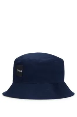 Kids' bucket hat in cotton twill with rubber logo