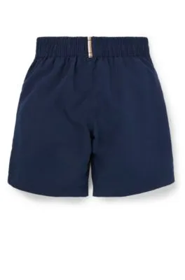 Kids' swim shorts in peached fabric with contrast logo