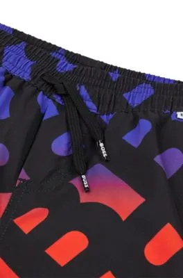 Kids' swim shorts with gradient monogram print