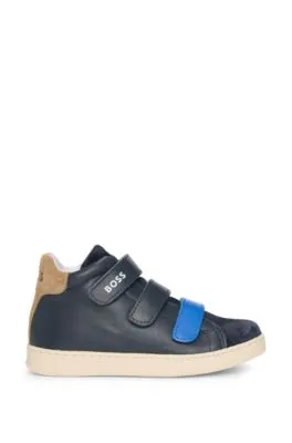 Kids' trainers in leather with branded touch-closure straps